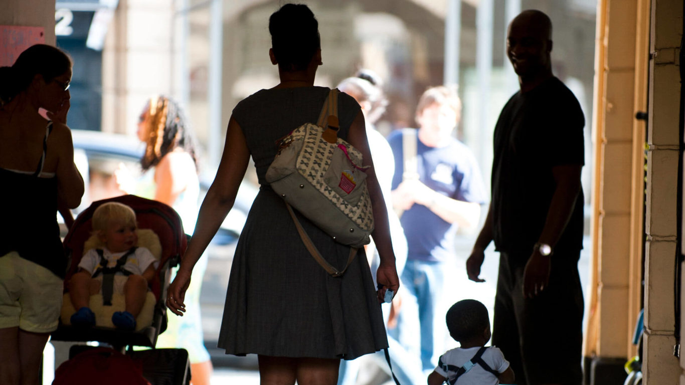 Happy families enjoying a welcoming entrance at The Clarendon Hotel, emphasising family-friendly amenities and warm hospitality.