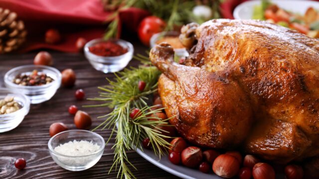 Succulent roasted turkey, sprinkled with herbs, surrounded by festive pine and spices, awaits at The Clarendon dining.